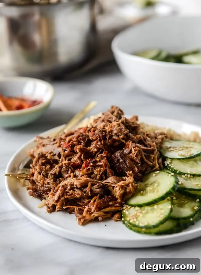 slow cooker sweet and spicy pork shoulder I howsweeteats.com