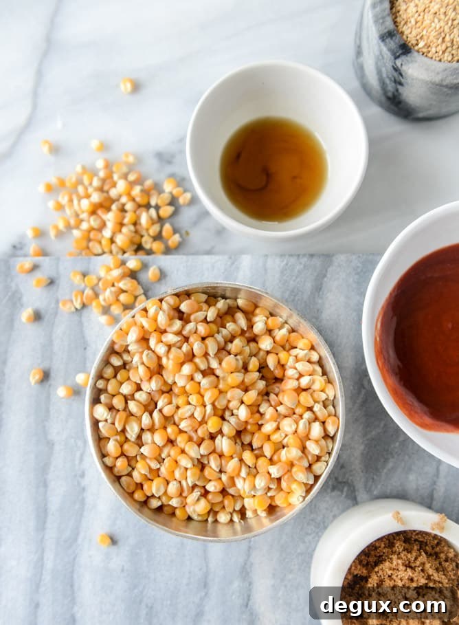 brown sugar sriracha sesame popcorn I howsweeteats.com