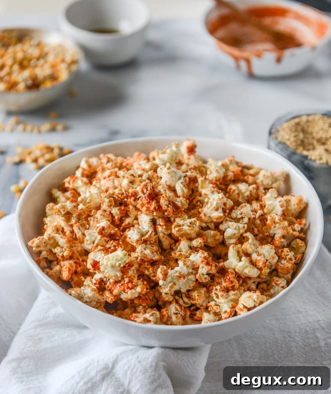 brown sugar sriracha sesame popcorn I howsweeteats.com