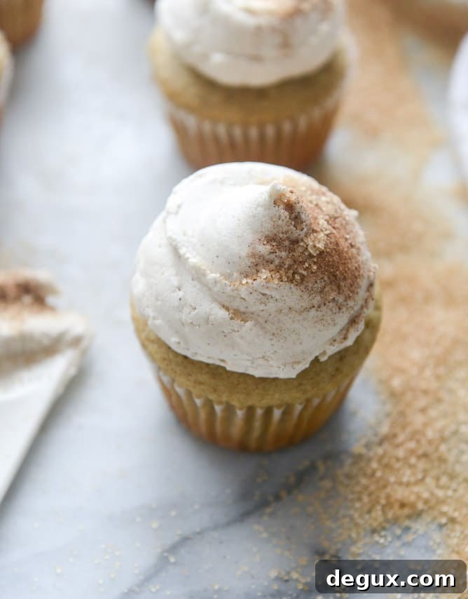 chai cupcakes with brown butter chai icing and crunchy sugar sprinkle I howsweeteats.com