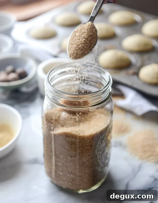 chai cupcakes with brown butter chai icing and crunchy sugar sprinkle I howsweeteats.com