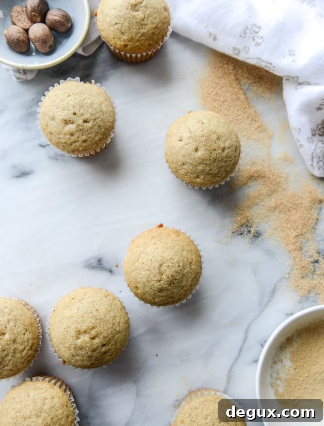chai cupcakes with brown butter chai icing and crunchy sugar sprinkle I howsweeteats.com