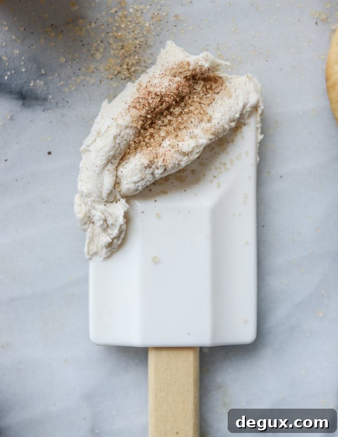 chai cupcakes with brown butter chai icing and crunchy sugar sprinkle I howsweeteats.com