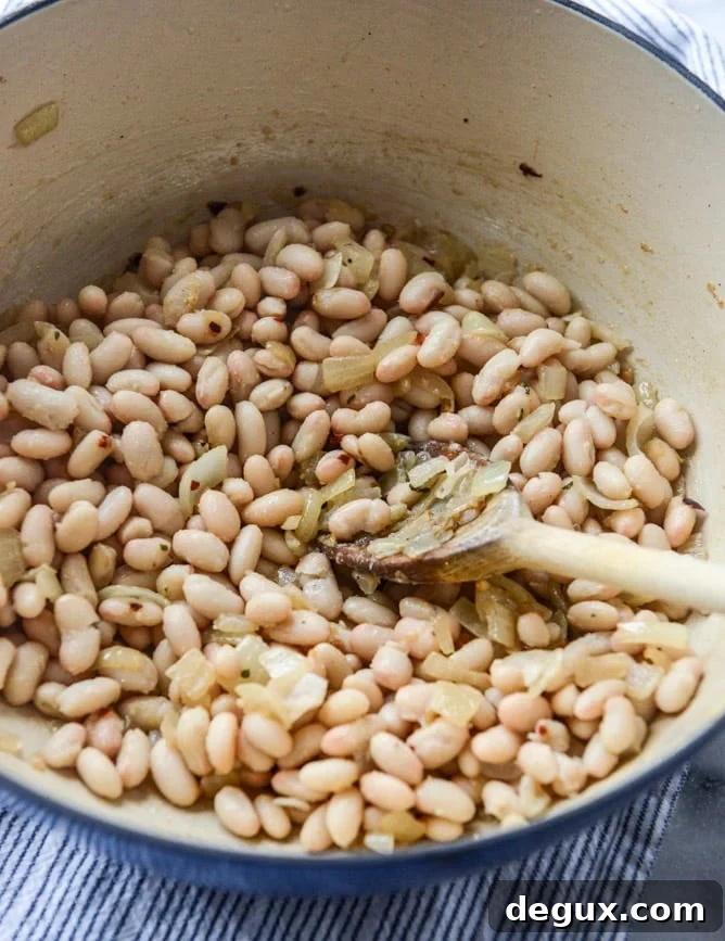 white bean soup with crumbled bacon and spiced brown butter I howsweeteats.com
