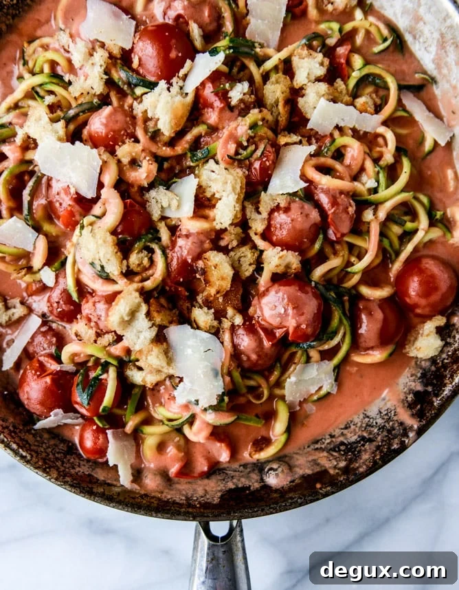 zucchini noodles with garlic tomato cream sauce I howsweeteats.com