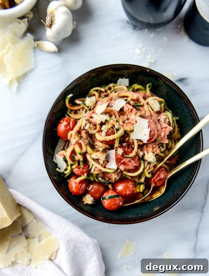 zucchini noodles with garlic tomato cream sauce I howsweeteats.com