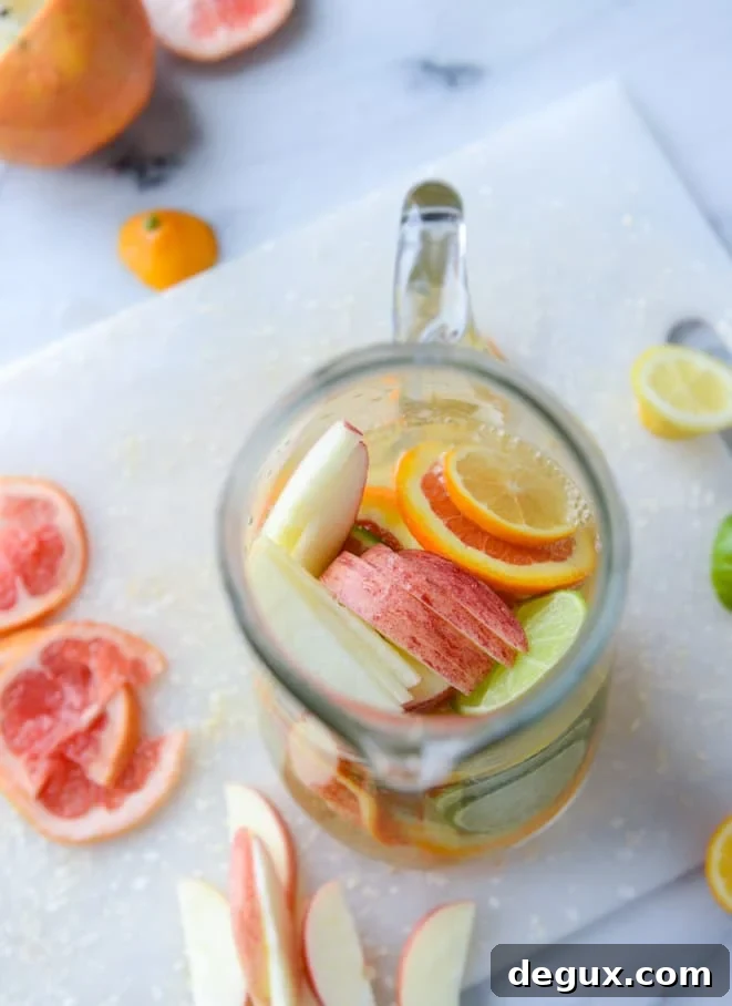 Meyer Lemon Shandy Sangria Recipe for Bright Citrus Cocktails 7 meyer lemon shandy sangria I howsweeteats.com