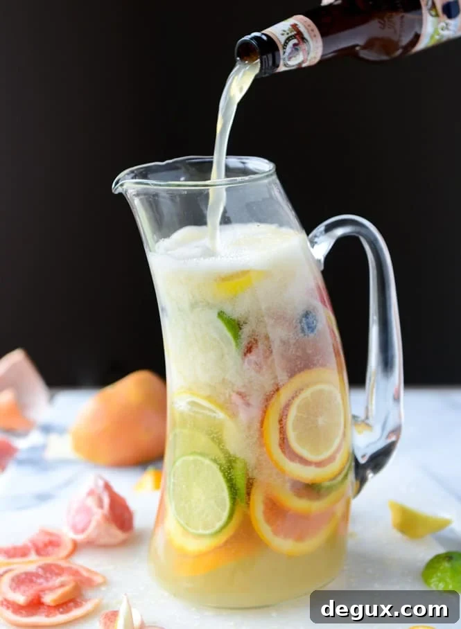 Meyer Lemon Shandy Sangria Recipe for Bright Citrus Cocktails 9 meyer lemon shandy sangria I howsweeteats.com