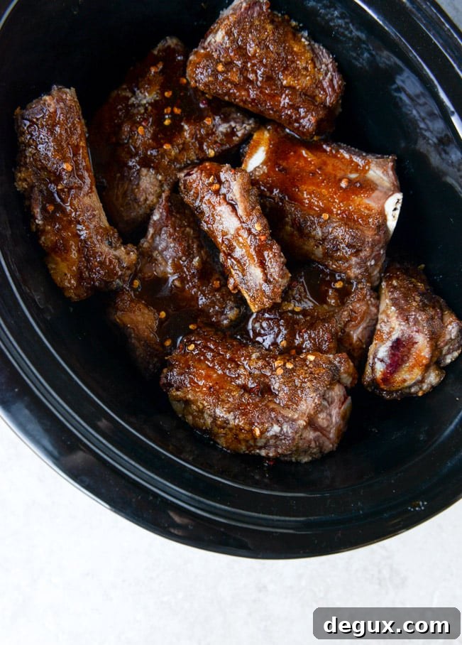 slow cooker sweet + spicy short rib tacos with sesame guacamole I howsweeteats.com