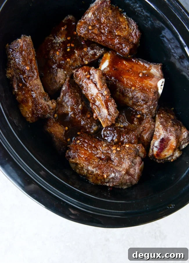 slow cooker sweet + spicy short rib tacos with sesame guacamole I howsweeteats.com