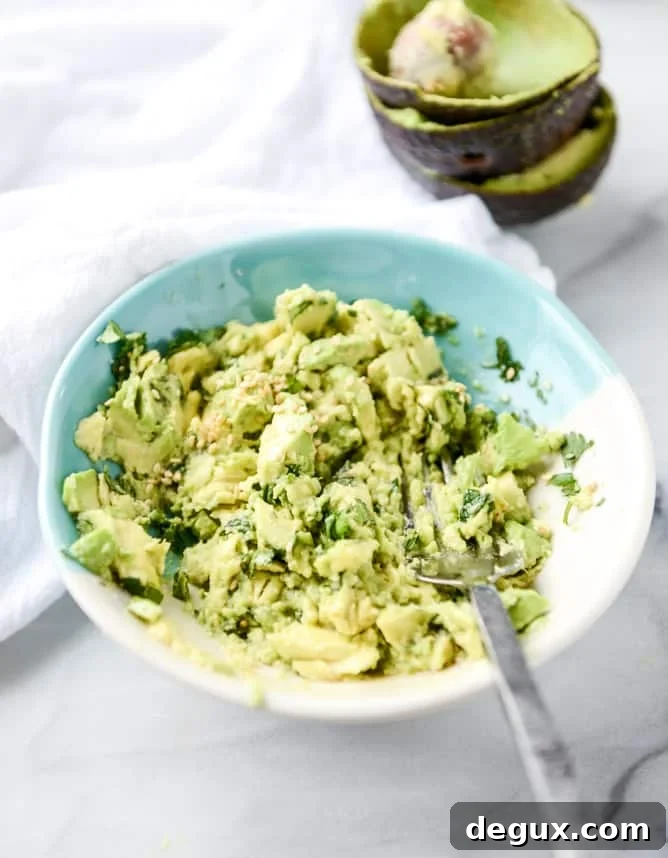 slow cooker sweet + spicy short rib tacos with sesame guacamole I howsweeteats.com