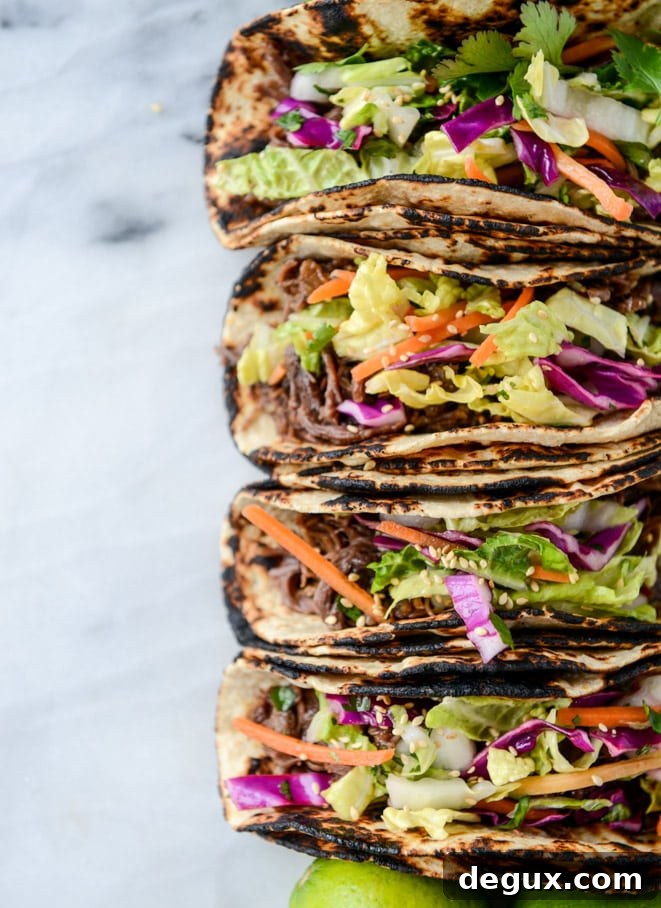 slow cooker sweet + spicy short rib tacos with sesame guacamole I howsweeteats.com