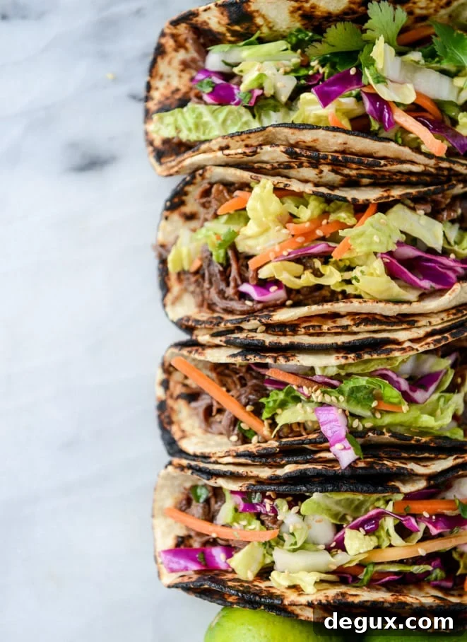 slow cooker sweet + spicy short rib tacos with sesame guacamole I howsweeteats.com
