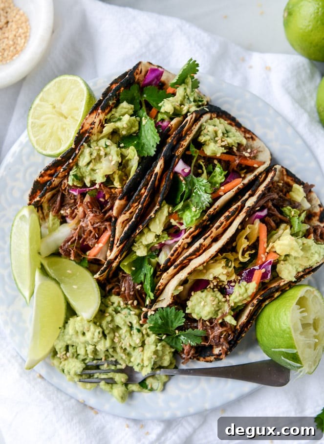 slow cooker sweet + spicy short rib tacos with sesame guacamole I howsweeteats.com