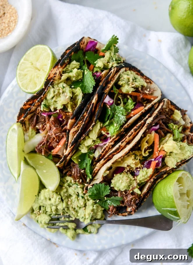 slow cooker sweet + spicy short rib tacos with sesame guacamole I howsweeteats.com