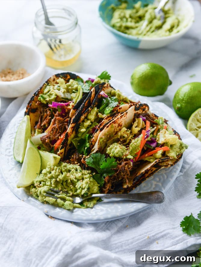 slow cooker sweet + spicy short rib tacos with sesame guacamole I howsweeteats.com