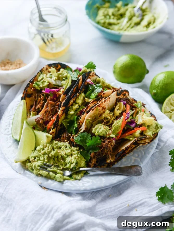 slow cooker sweet + spicy short rib tacos with sesame guacamole I howsweeteats.com