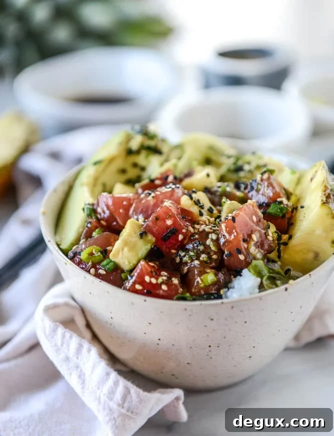 ahi poke bowl with avocado and pineapple I howsweeteats.com