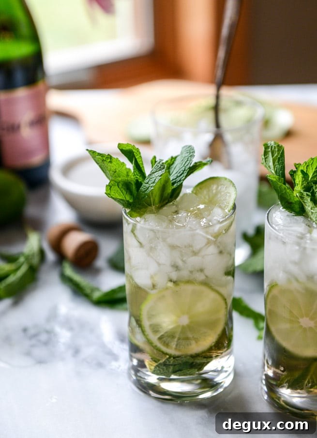 Rosé Champagne Mojitos with Homemade Champagne Syrup 8 rosé champagne mojitos I howsweeteats.com