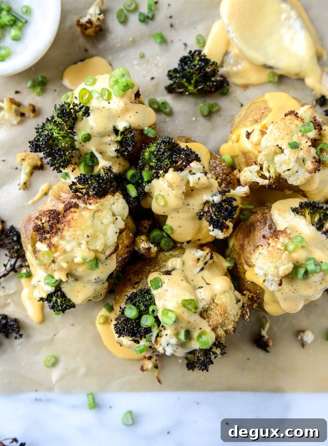 Roasted Cauliflower & Broccoli Stuffed Potatoes with Cheesy Butternut Sauce 6 stuffed potatoes with butternut cheese sauce I howsweeteats.com