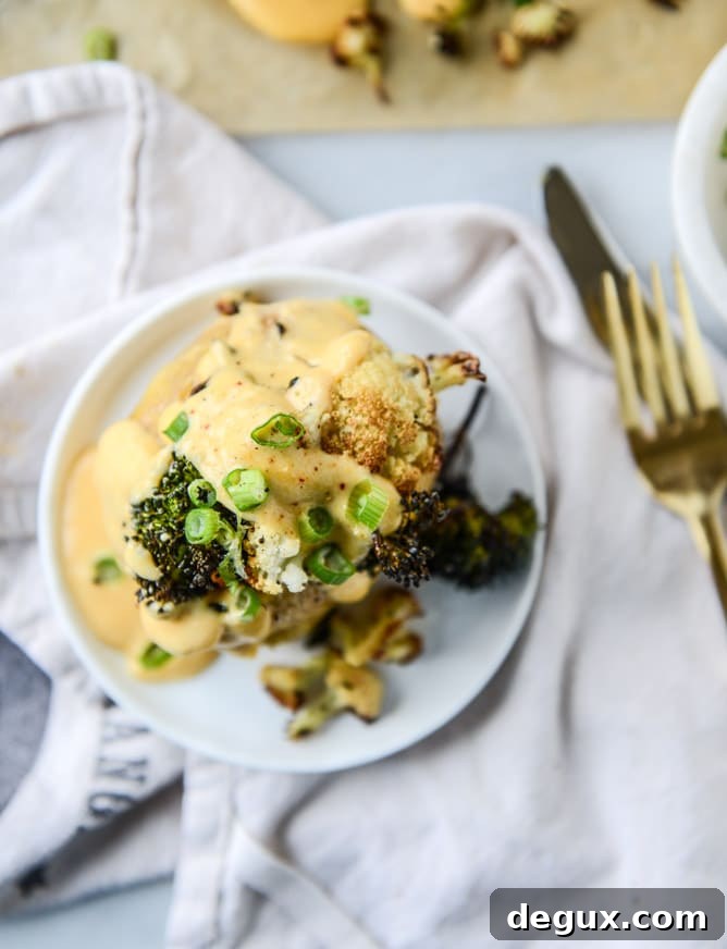 Roasted Cauliflower & Broccoli Stuffed Potatoes with Cheesy Butternut Sauce 10 stuffed potatoes with butternut cheese sauce I howsweeteats.com