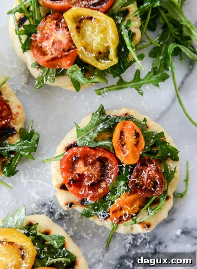 charred tomato and garlic butter mini pizzas I howsweeteats.com