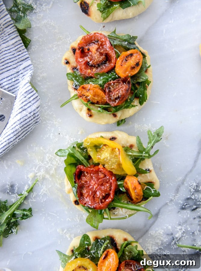charred tomato and garlic butter mini pizzas I howsweeteats.com