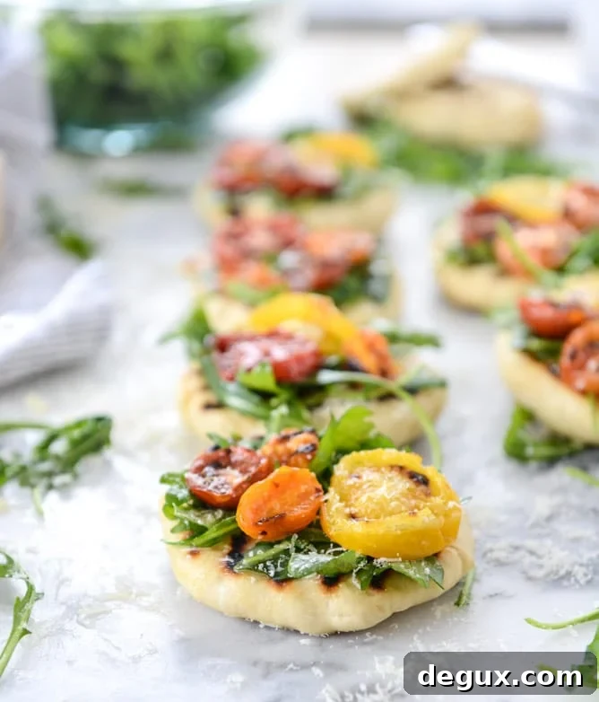 charred tomato and garlic butter mini pizzas I howsweeteats.com