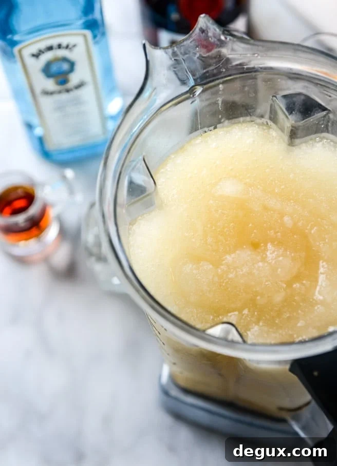 Leap Year Cocktail Slushies: Festive Frozen Drinks for Celebrations 3 the leap year cocktail slushie I howsweeteats.com