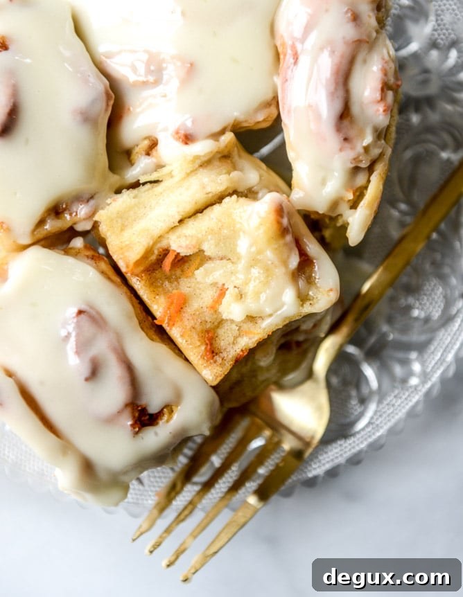 carrot cake cinnamon rolls with mascarpone icing I howsweeteats.com