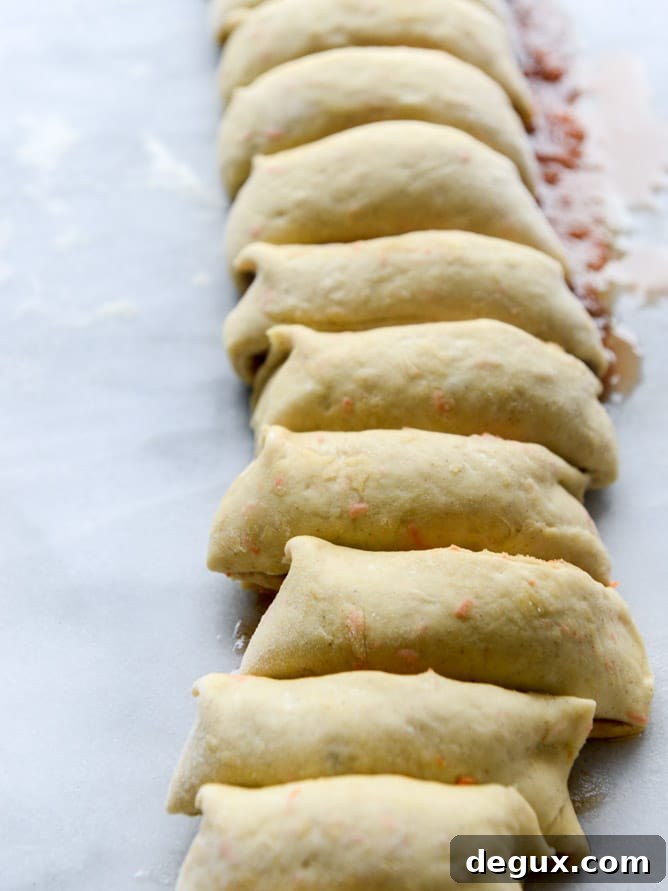 carrot cake cinnamon rolls with mascarpone icing I howsweeteats.com