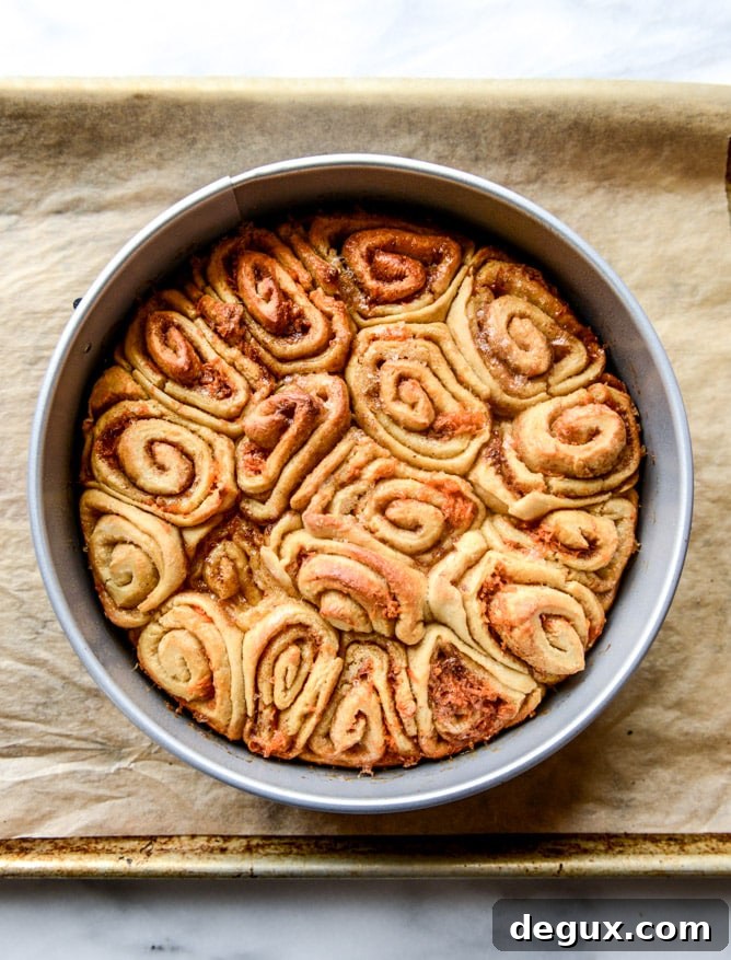 carrot cake cinnamon rolls with mascarpone icing I howsweeteats.com