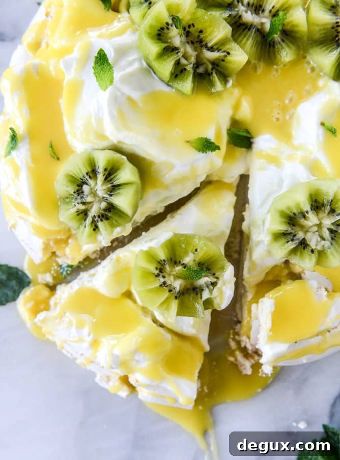 marshmallow pavlova with pineapple curd I howsweeteats.com