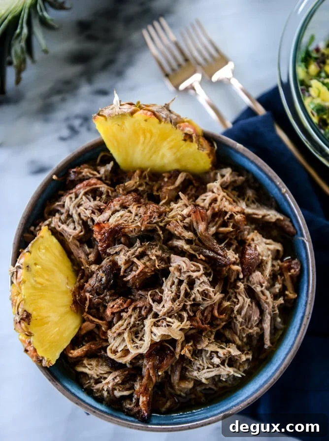 Slow Cooker Jerk Pork Pineapple Rice Bowls for Flavorful Dinners 6 slow cooker jerk pork in pineapple rice bowls I howsweeteats.com