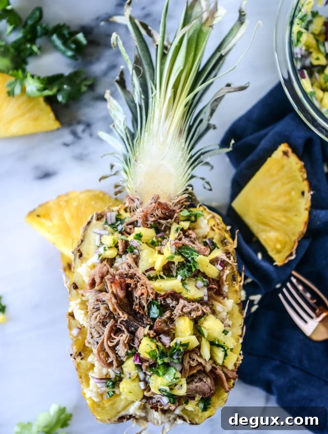 Slow Cooker Jerk Pork Pineapple Rice Bowls for Flavorful Dinners 9 slow cooker jerk pork in pineapple rice bowls I howsweeteats.com