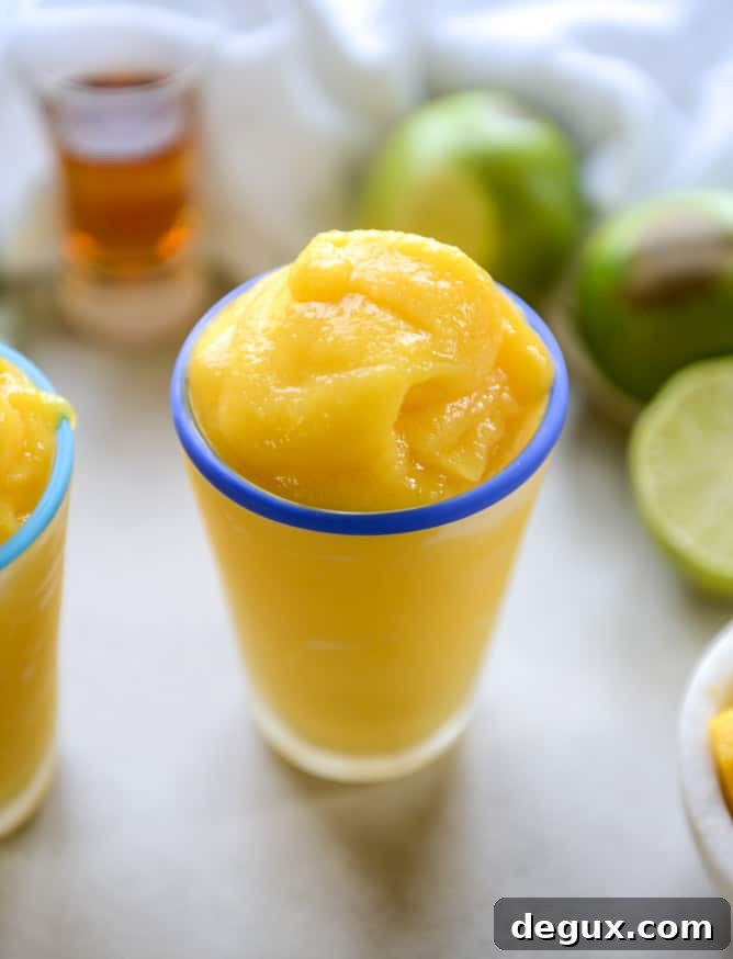 Mango Margarita Frosty Recipe — Creamy Frozen Cocktail Guide 5 fresh mango margarita frosty I howsweeteats.com