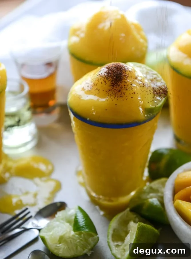 Mango Margarita Frosty Recipe — Creamy Frozen Cocktail Guide 7 fresh mango margarita frosty I howsweeteats.com
