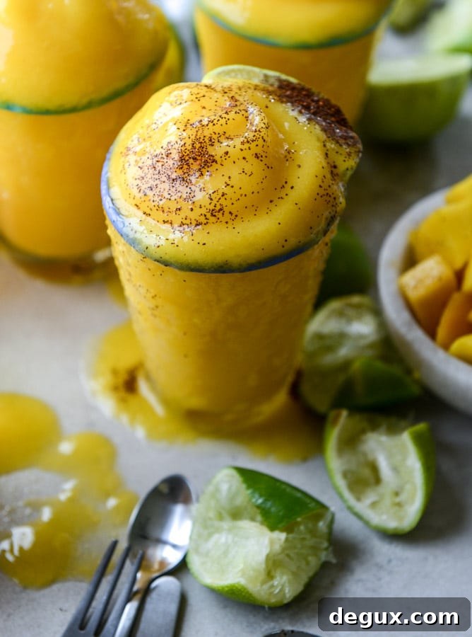 Mango Margarita Frosty Recipe — Creamy Frozen Cocktail Guide 8 fresh mango margarita frosty I howsweeteats.com