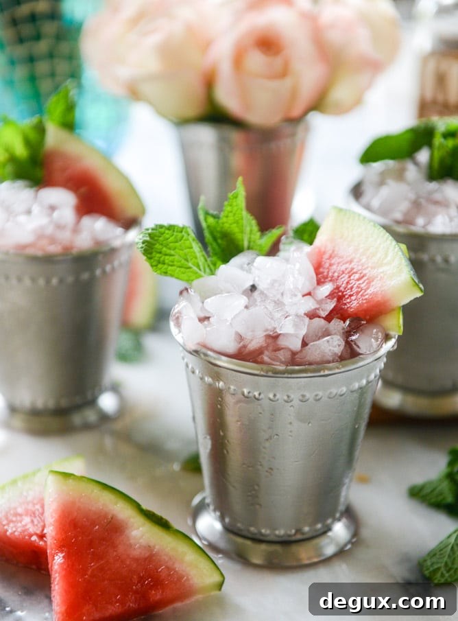 Watermelon Mint Julep Cocktail Recipe for Summer Sipping 2 fresh watermelon mint juleps I howsweeteats.com