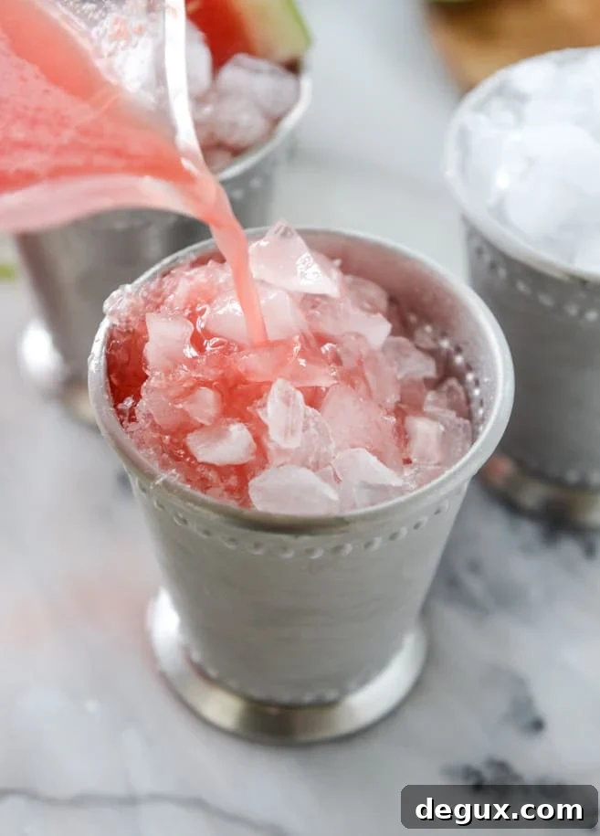 Watermelon Mint Julep Cocktail Recipe for Summer Sipping 5 fresh watermelon mint juleps I howsweeteats.com