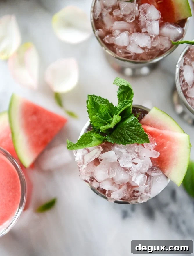 Watermelon Mint Julep Cocktail Recipe for Summer Sipping 6 fresh watermelon mint juleps I howsweeteats.com