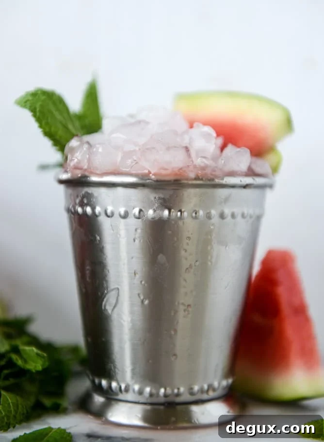 Watermelon Mint Julep Cocktail Recipe for Summer Sipping 9 fresh watermelon mint juleps I howsweeteats.com