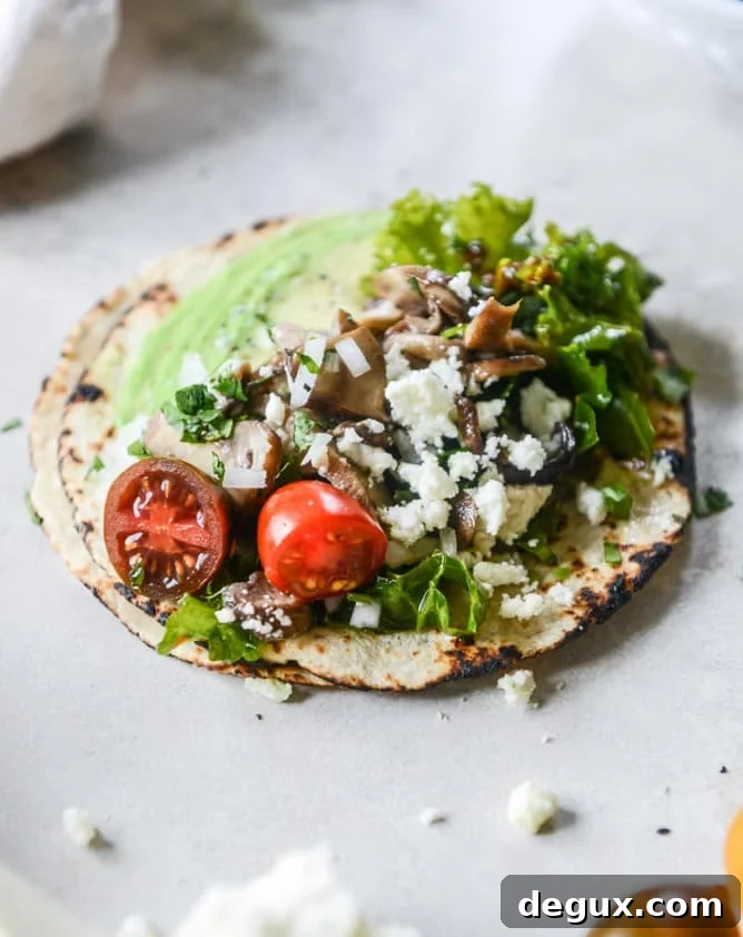 chipotle marinated kale and smoky mushroom tacos I howsweeteats.com