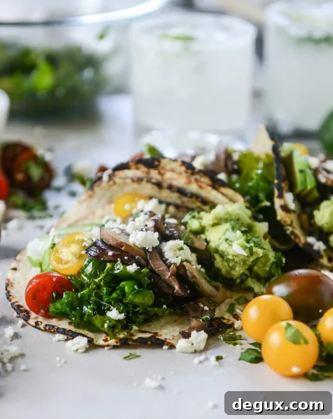 chipotle marinated kale and smoky mushroom tacos I howsweeteats.com