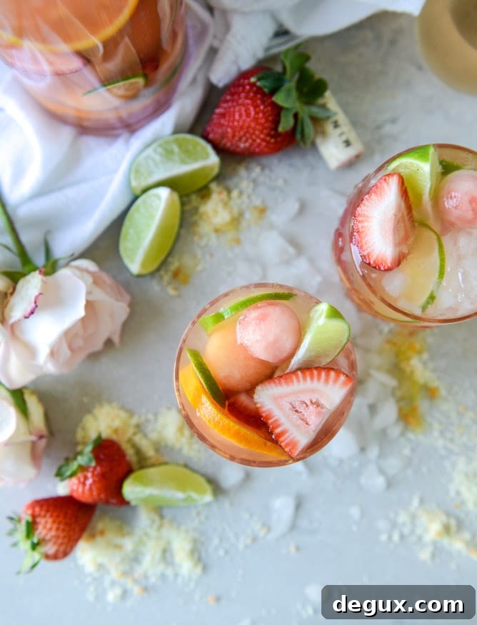 Refreshing Rosé Sangria Recipe: Sparkling Summer Cocktail Guide 2 rosé sangria I howsweeteats.com