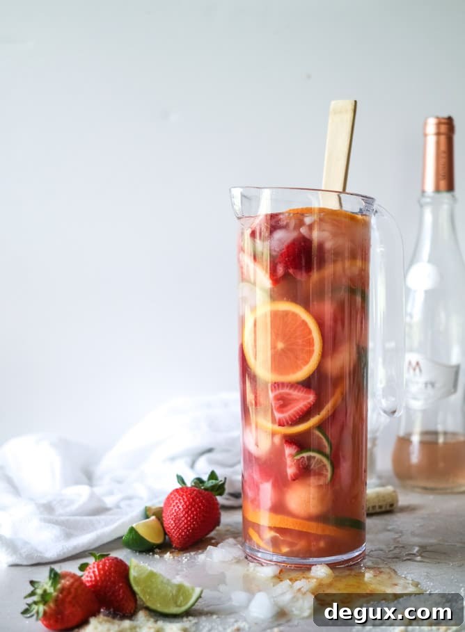 Refreshing Rosé Sangria Recipe: Sparkling Summer Cocktail Guide 3 rosé sangria I howsweeteats.com
