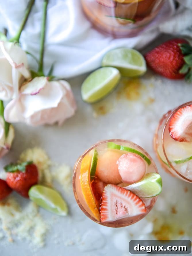 Refreshing Rosé Sangria Recipe: Sparkling Summer Cocktail Guide 9 rosé sangria I howsweeteats.com