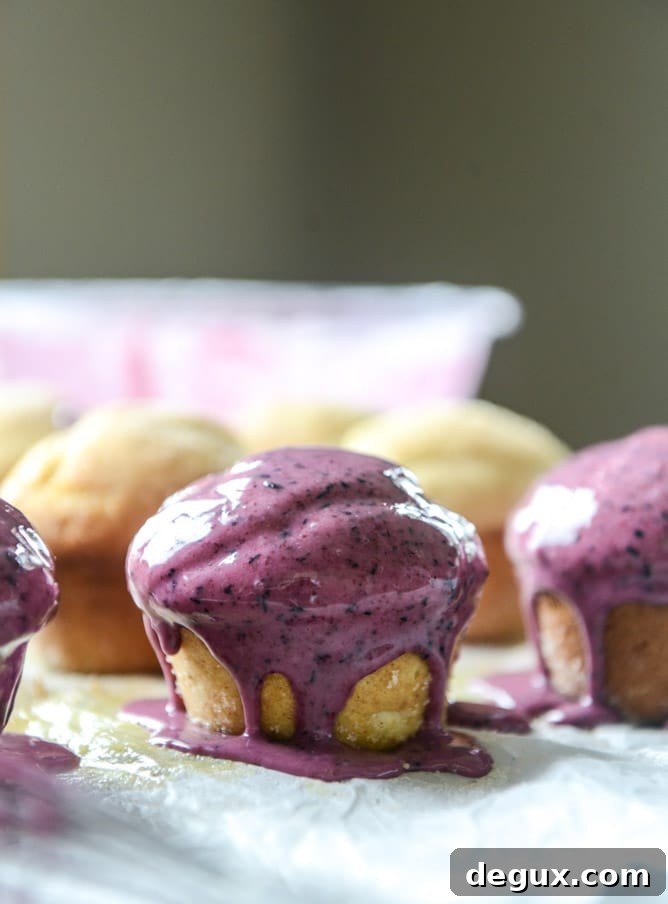 blueberry glazed doughnut muffins I howsweeteats.com
