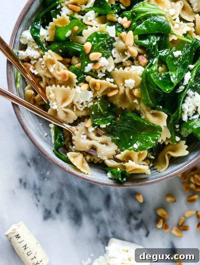 farfalle with marinated feta, arugula and toasted pine nuts I howsweeteats.com