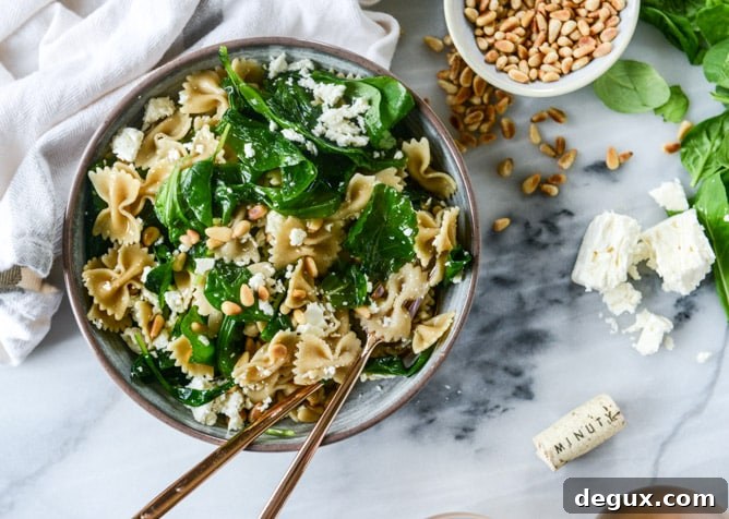 farfalle with marinated feta, arugula and toasted pine nuts I howsweeteats.com